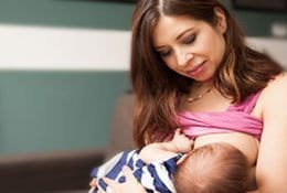 Woman breastfeeding baby