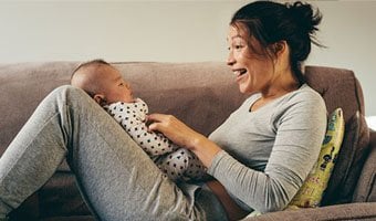 A mother and her child on a couch